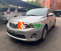 Clean 2013 Toyota Corolla For Sale in Surulere - Call 08025823573